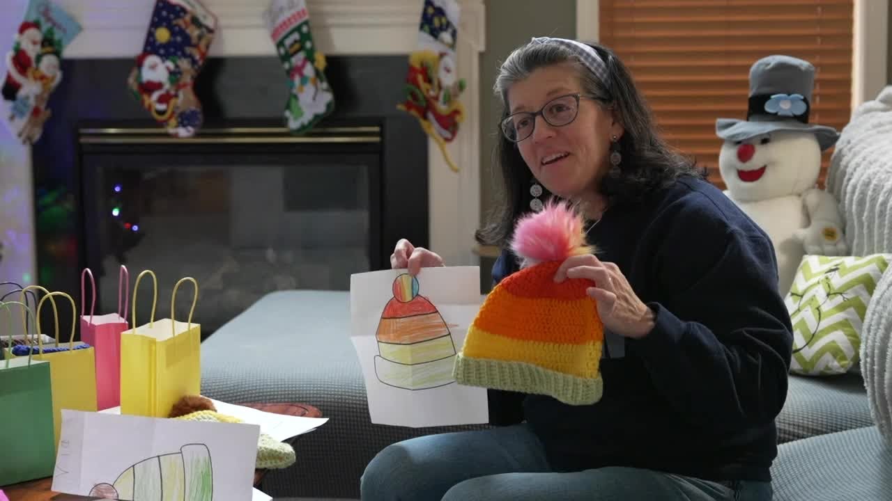 Chesterfield teacher crochets custom hats for students based on their designs