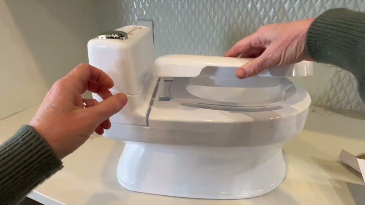 Fisher-Price Potty Trainer Review | Easy, Fun & Real Flushing Sounds