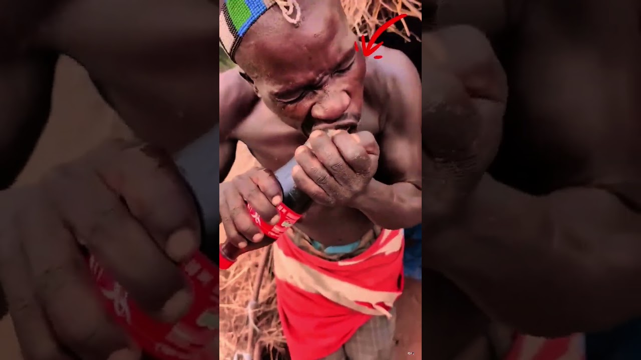 Saba is very surprised when she opens the soft water #bushmenlife #africanpeople #realafrica #funny