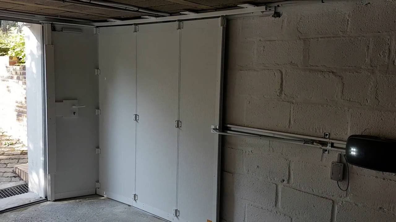 32 Cor&eacute;nov porte de garage sectionnelle coulissante portillon