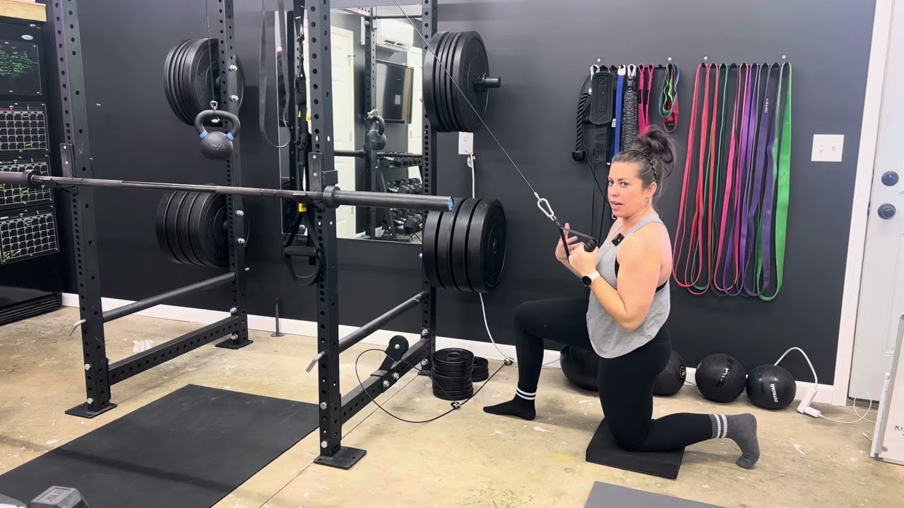 1/2 Kneel Single Arm Lat Pulldown with Reach