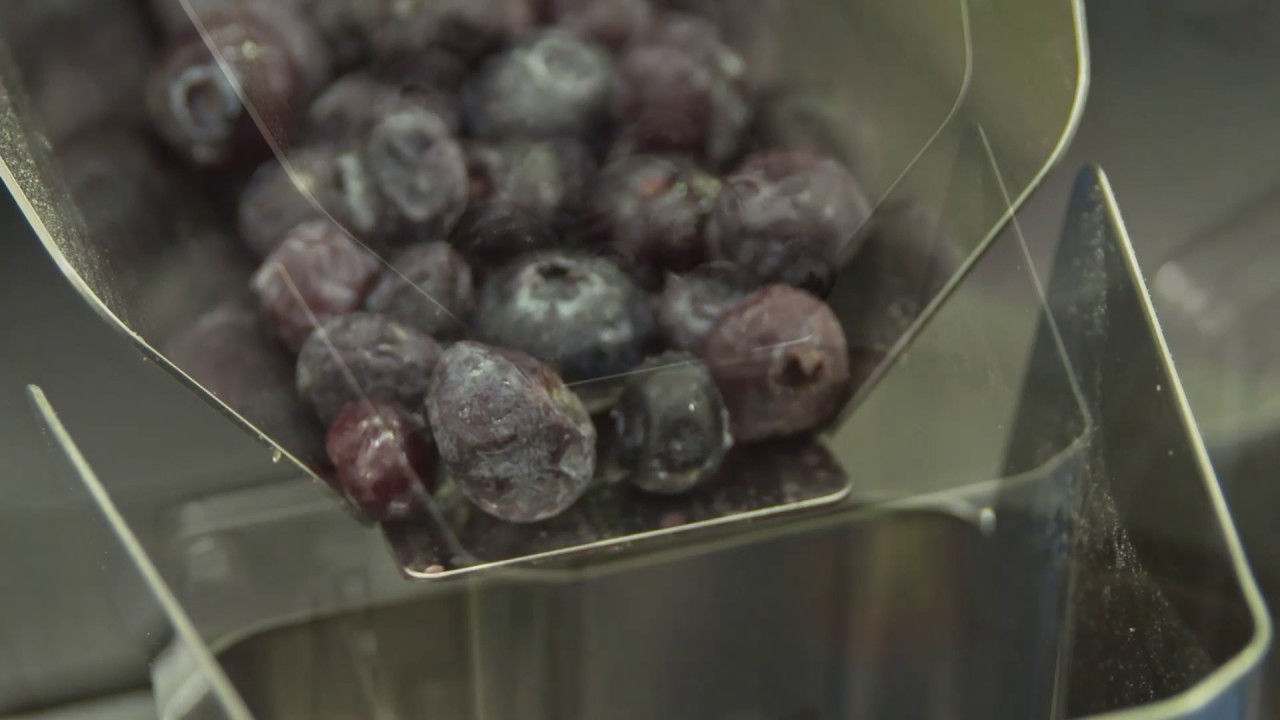 Weighing and depositing blueberries