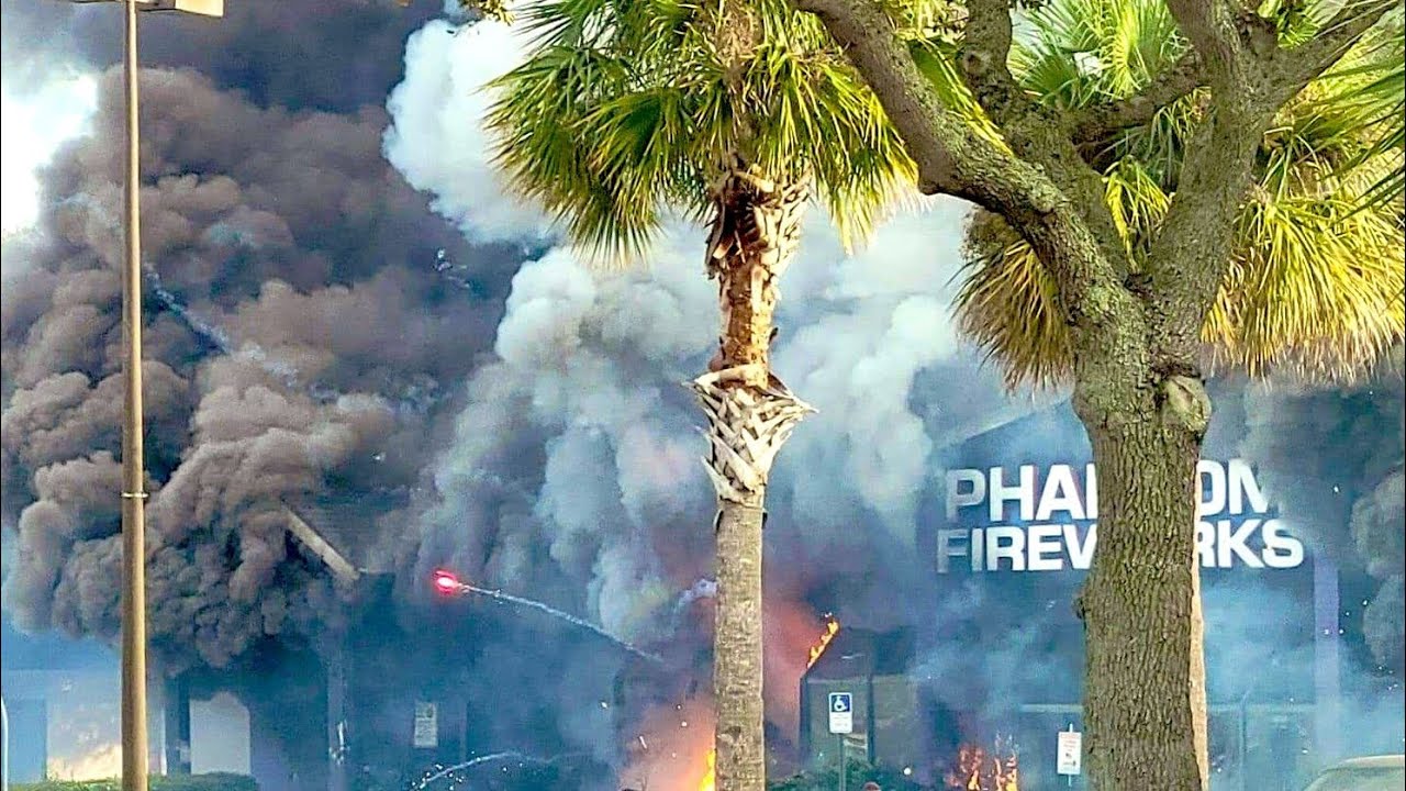 Massive fire at phantom fireworks store in Melbourne, Florida after a car rams through it