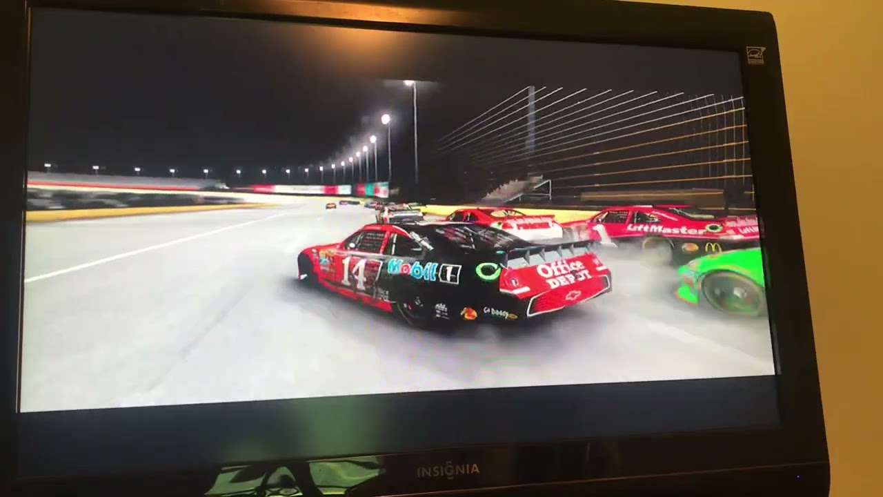 Tony Stewart Makes a Big Crash on the Backstretch at Charlotte in NASCAR Inside Line
