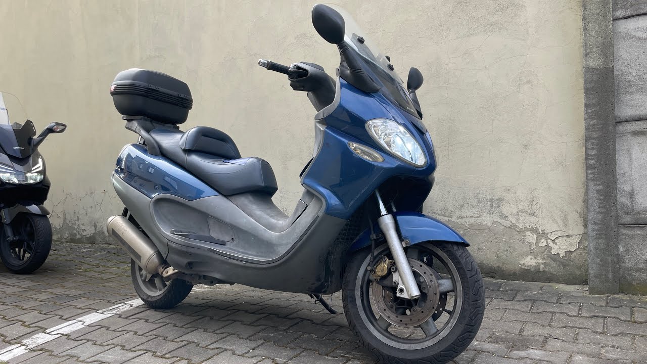 Piaggio 125 X9 2004 r Wymiana klocków hamulcowych przód