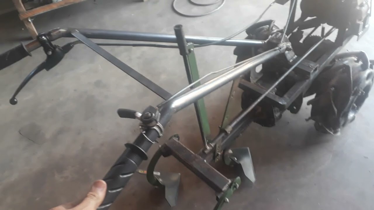 cultivador cazeiro com motor de moto e caixa de macha do del reis