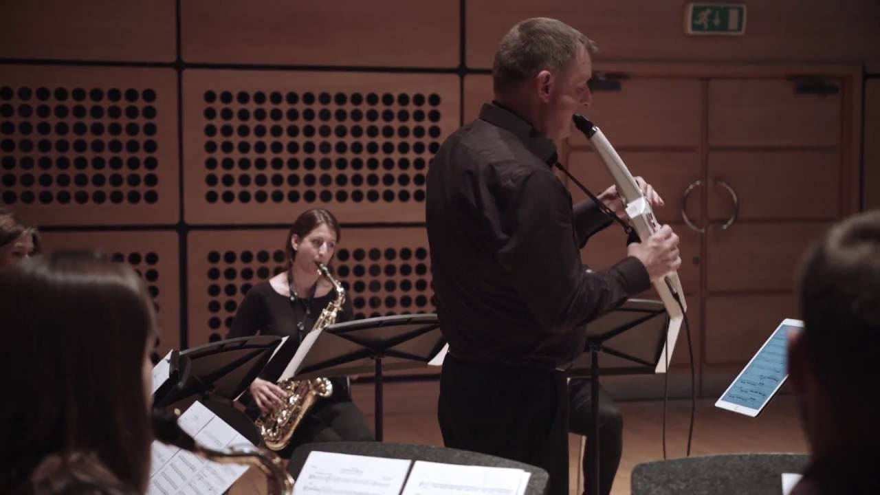 A classical-style ensemble with the Roland AE-10 Aerophone and various acoustic wind instruments.