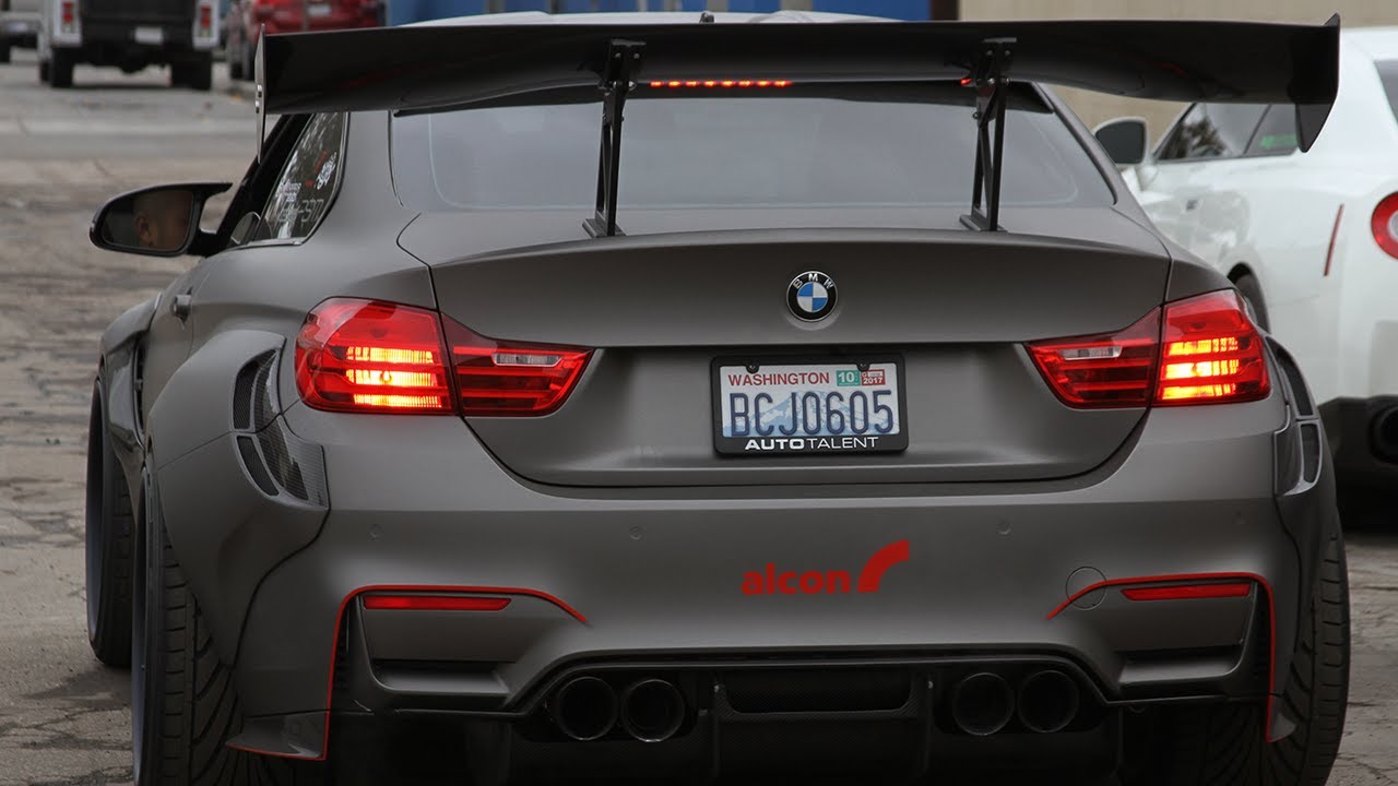 Carbon Fiber Widebody Kit on BMW M4 by PSM Dynamic - looking like a scene from Fast & Furious!