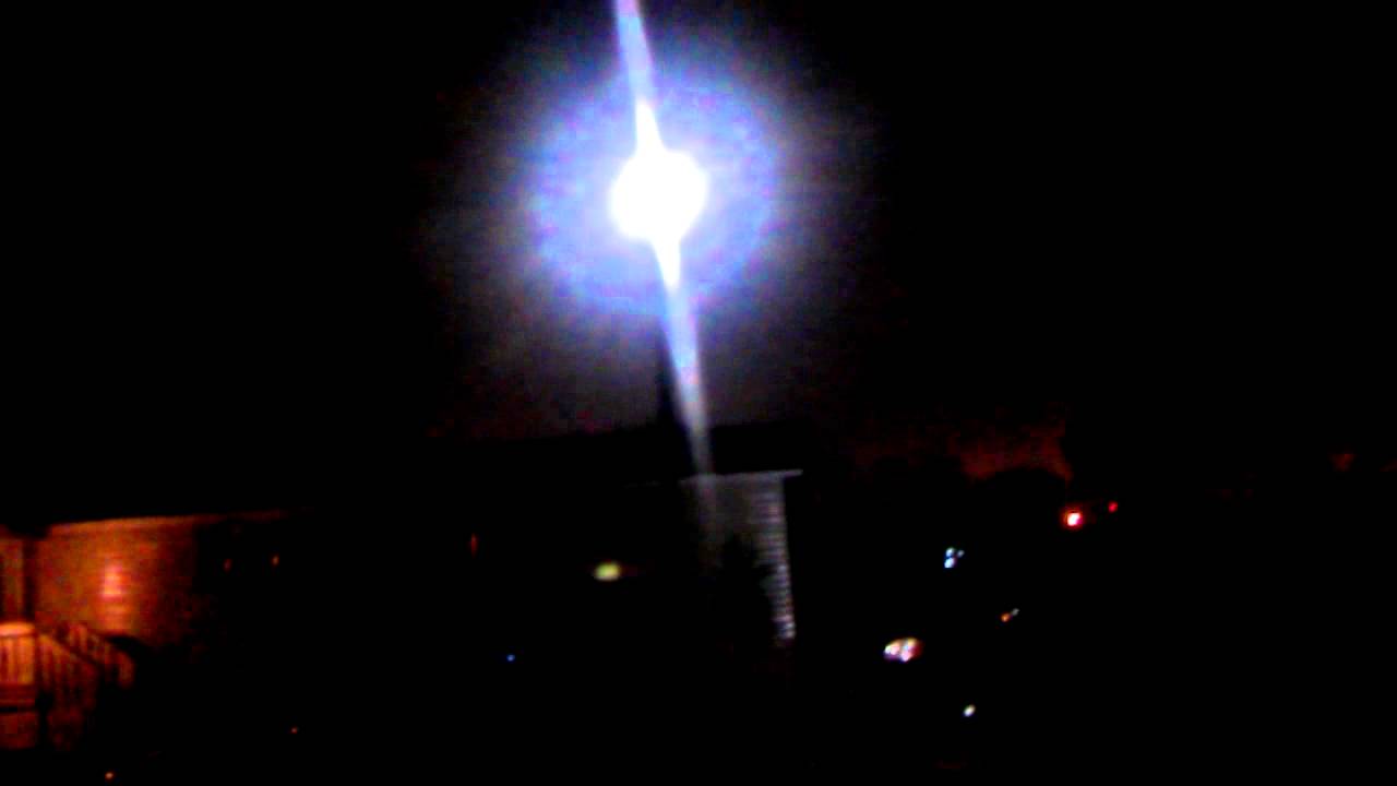 Mockingbird singing at night