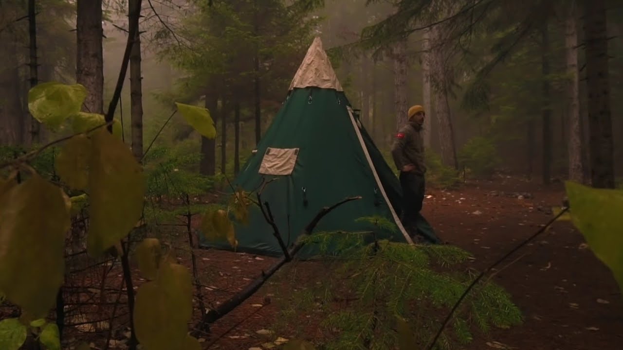 Caught in a Storm alone - camping in heavy rain, portaple wood stove canvas tent, Solo Camping