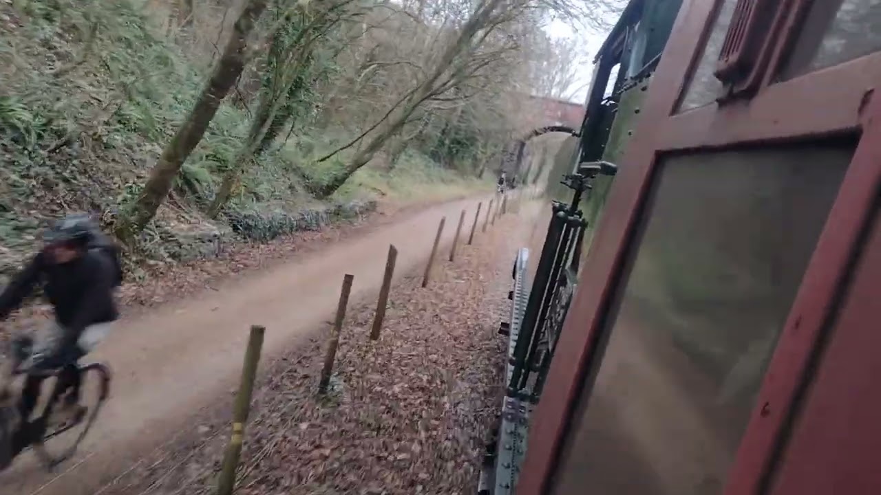 Here is gwr green 6695 engine whistles and chuffing up to oldland common towards the crossing 