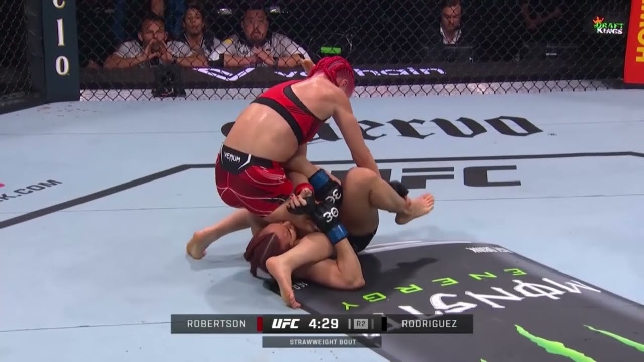 Gillian Robertson making it hard for Daniel Cormier to say triangle