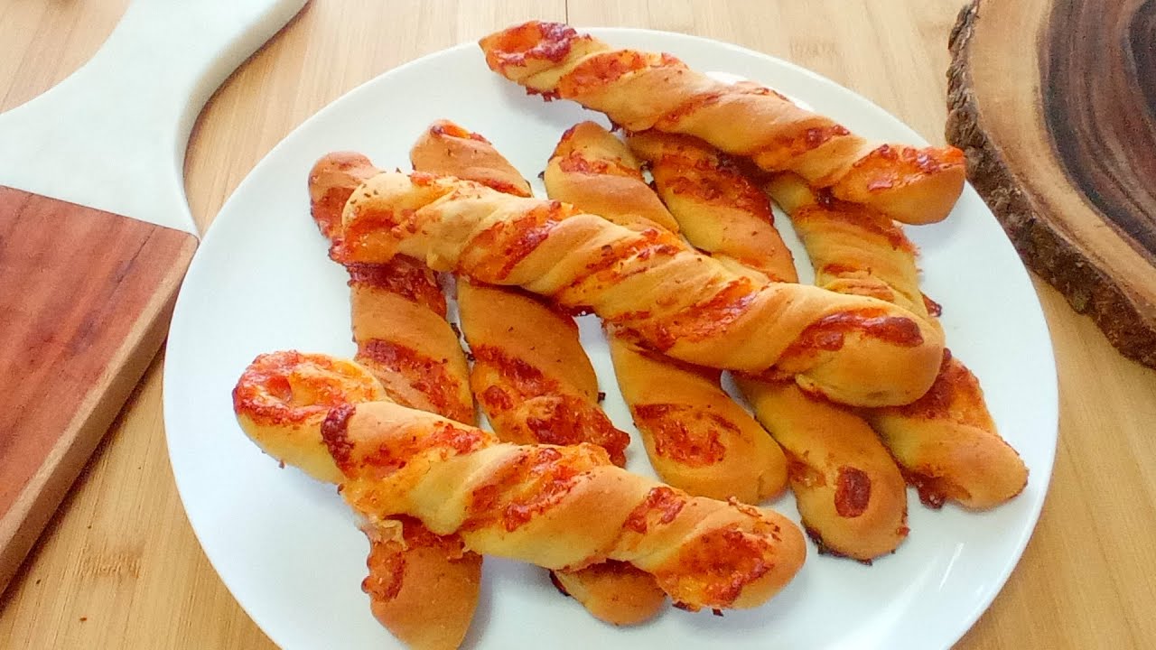 TORCETTI DI PIZZA FARCITI - FATTI IN CASA SENZA IMPASTO - PIZZA TWIST - PIZZA NEL FORNO DI CASA