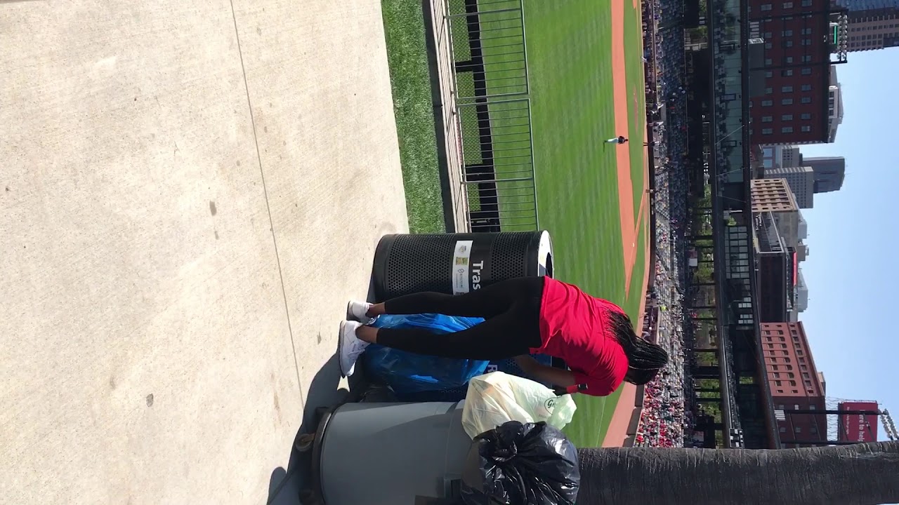 Saints custodian taking out the garbage