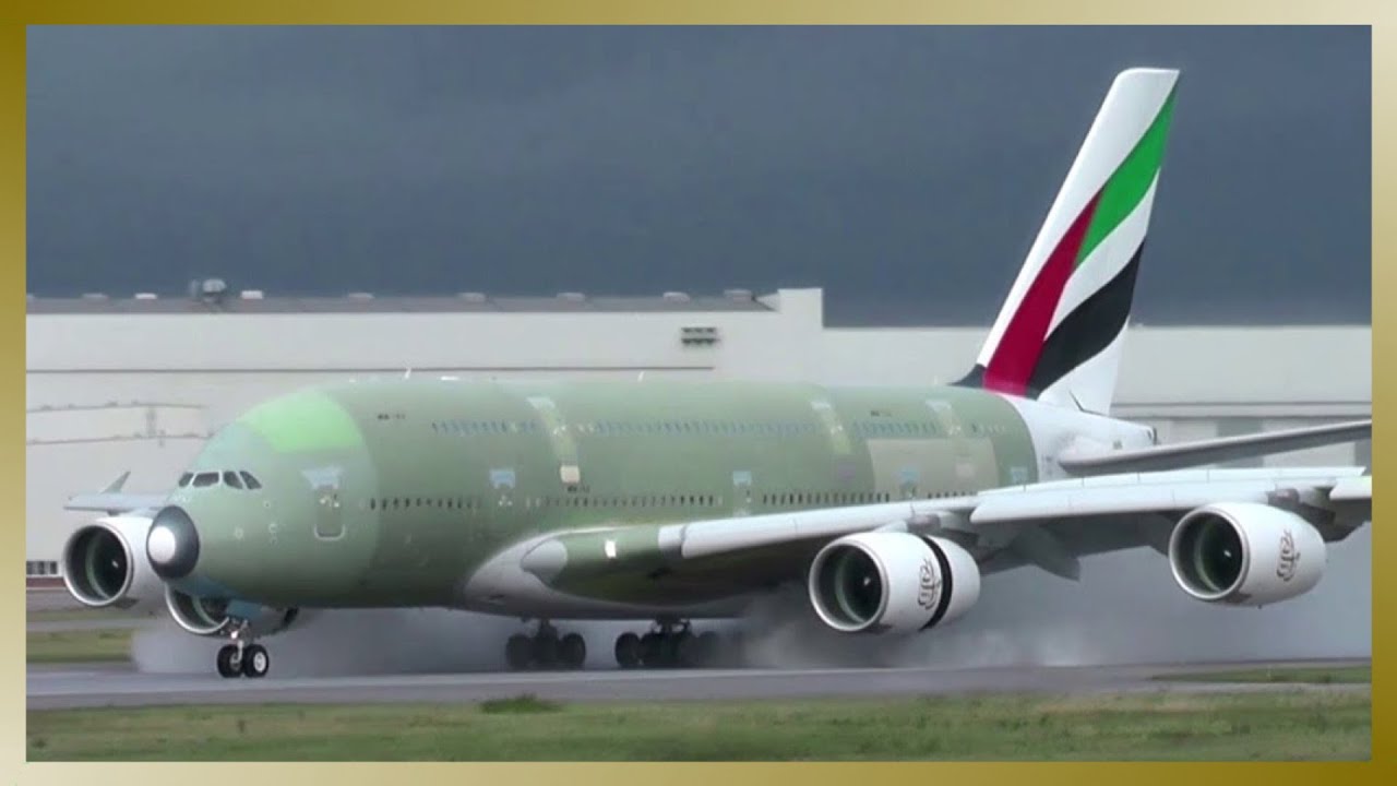 UNPAINTED Emirates AIRBUS A380 WET LANDING at Hamburg Finkenwerder Airport