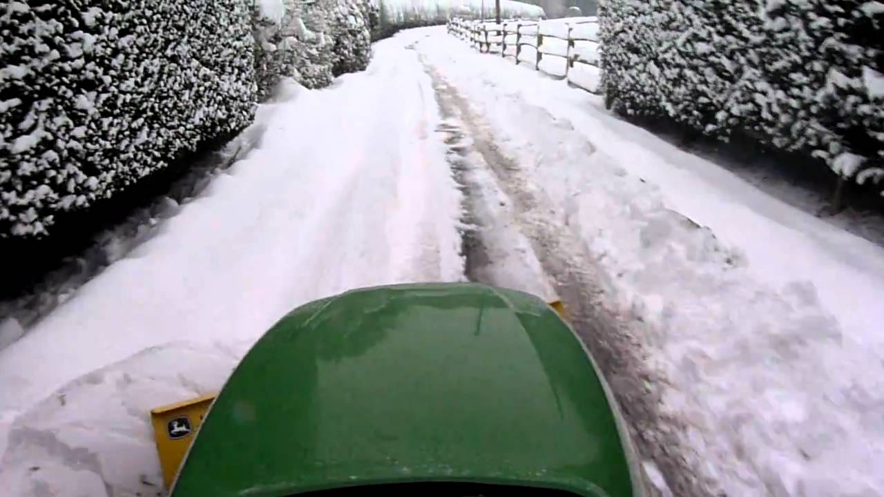 john deere x495 with 54 blade snow ploughing
