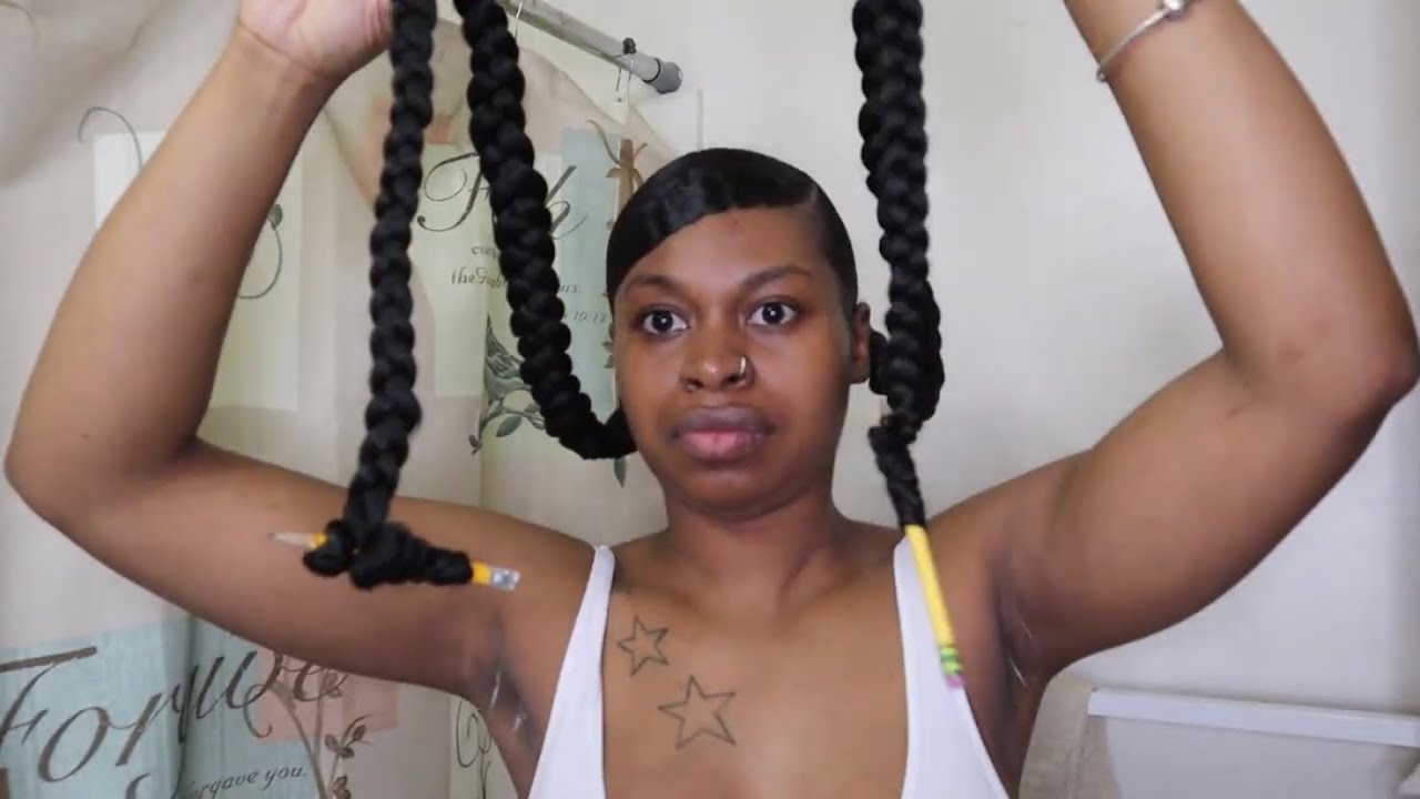2 ponytails with weave braided