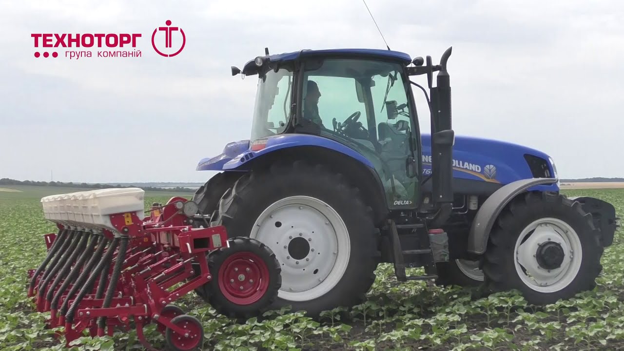 Робота трактора New Holland T6050 при міжрядній обробці посівів