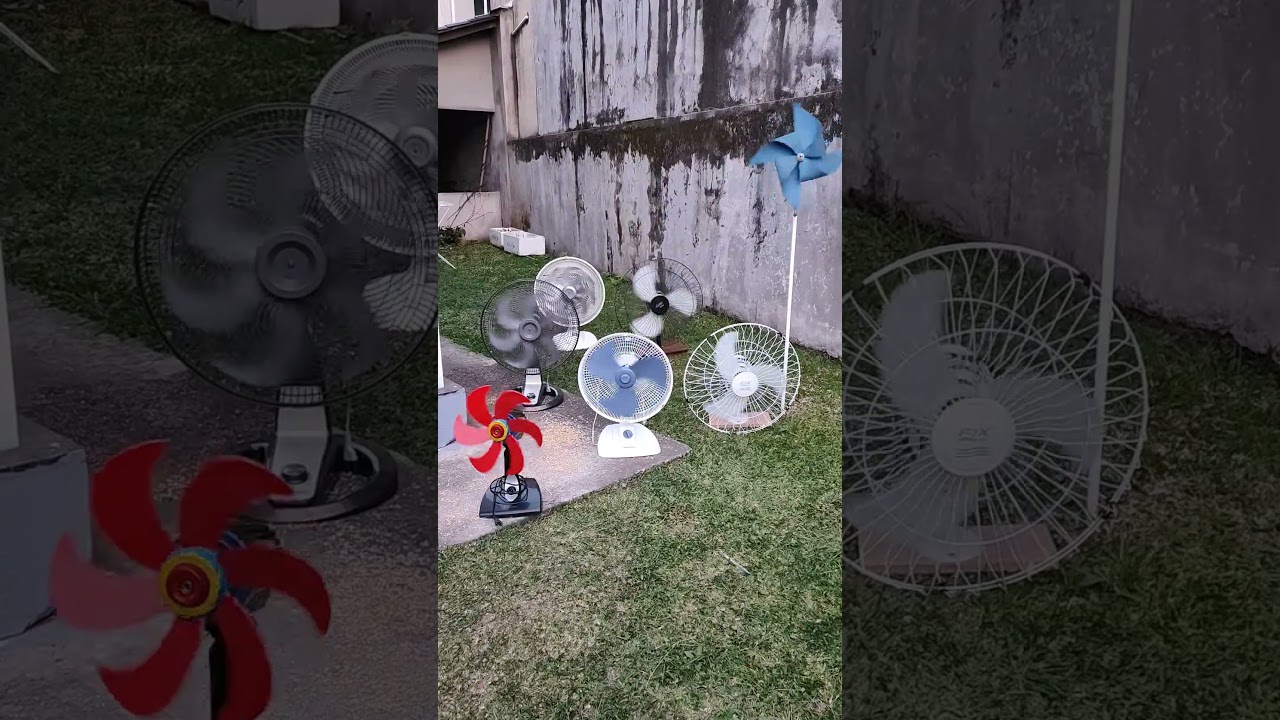 VENTILADORES GIRANDO COM A FORÇA DO VENTO NO JARDIM 