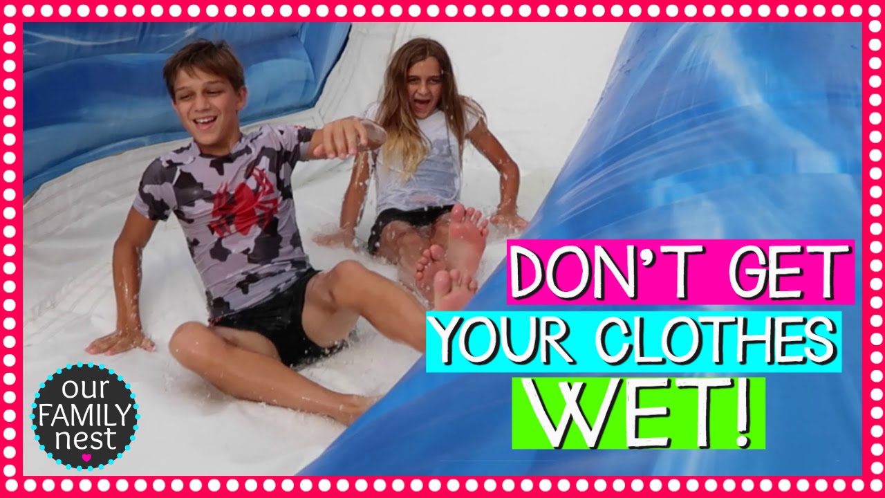 DON'T GET YOUR CLOTHES WET!!  GIANT INFLATABLE BOUNCY SLIDES