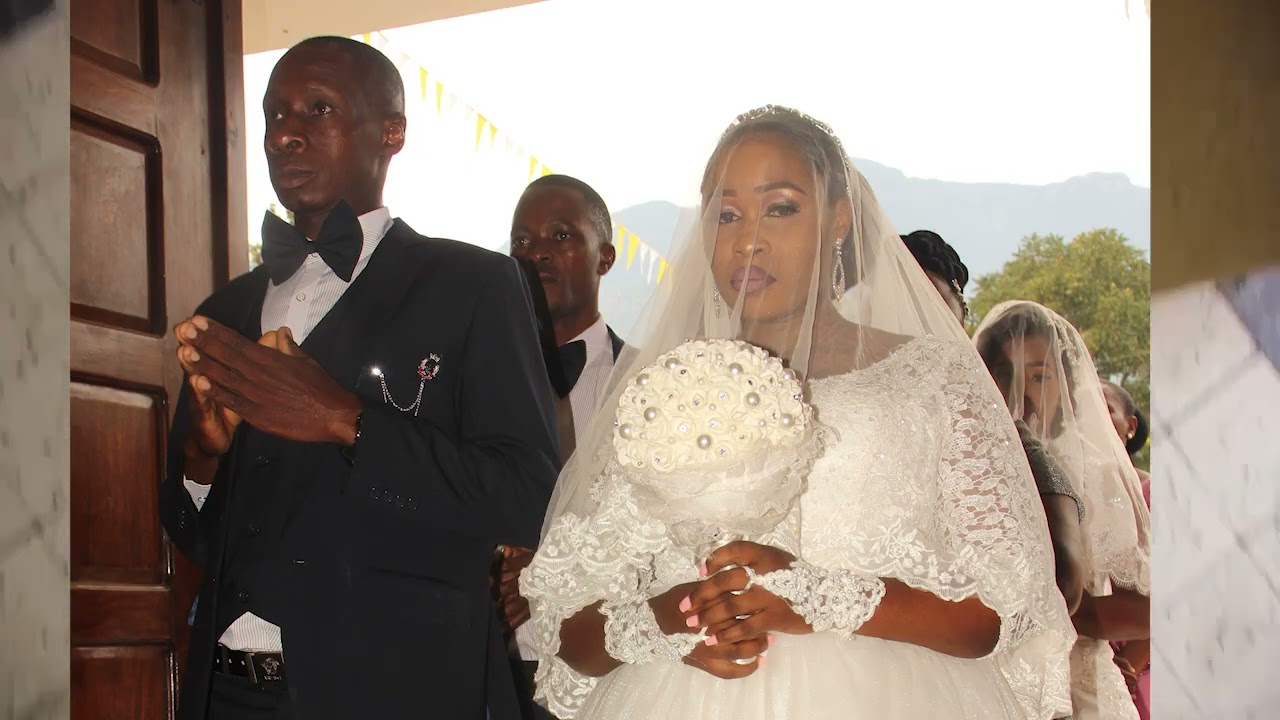 HARUSI YA LUCIAN PATRICK MDACHI NA CATHERINE ADRIAN LAMBETI_KANISA LA MT. ANDREA