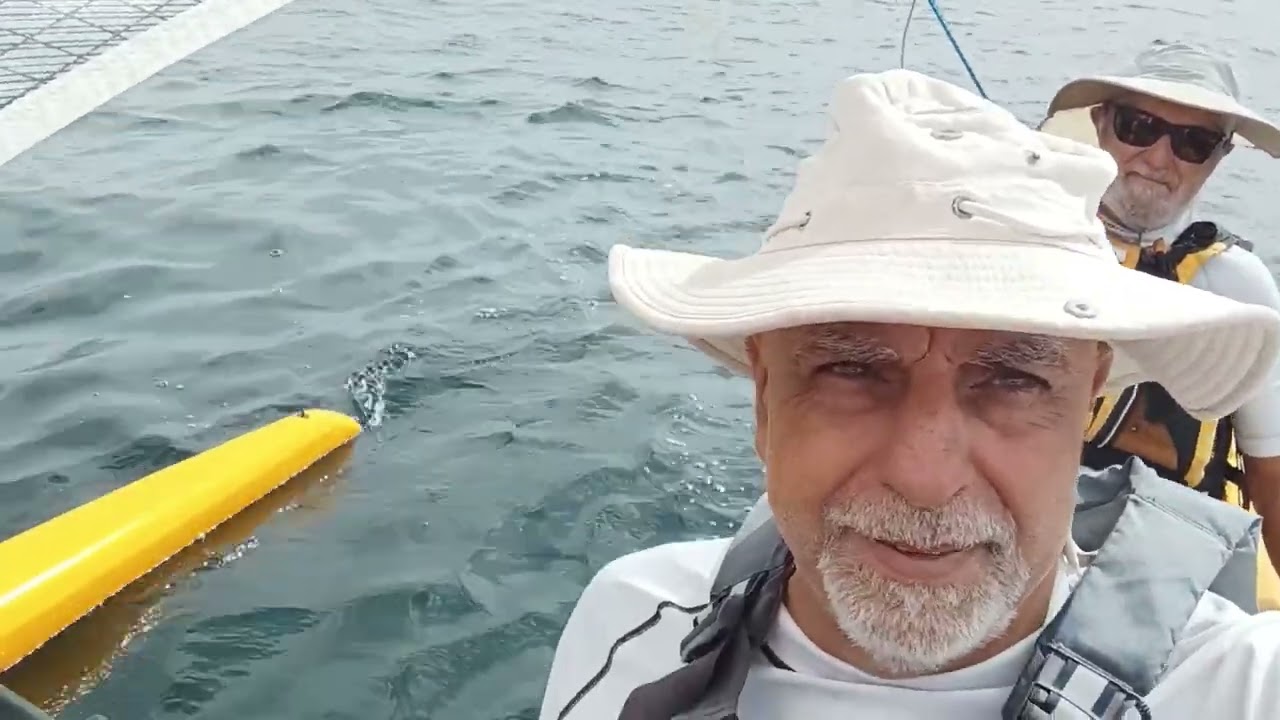 Circumnavigation of S  Pietro Island and comparison Hobie Tandem Island vs. the chinese clone