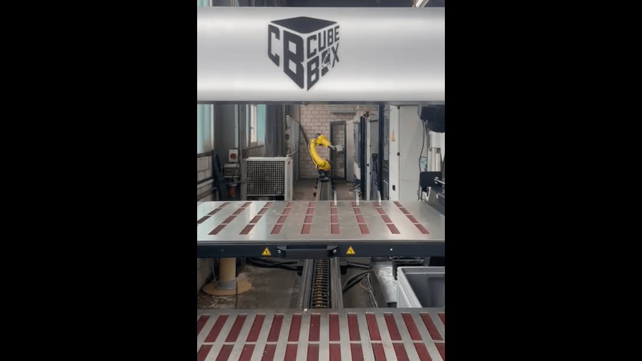 One Takumi Two Micron Machining Centers Feeding Application with Fanuc M20ID/25 Robot +7th Axis