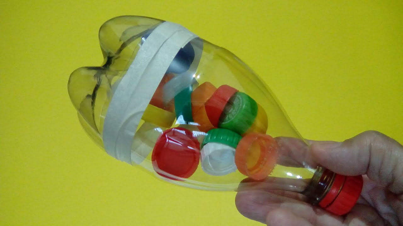 Como fazer chocalho com garrafa pet e tampinhas | Instrumentos musicais com materiais recicláveis