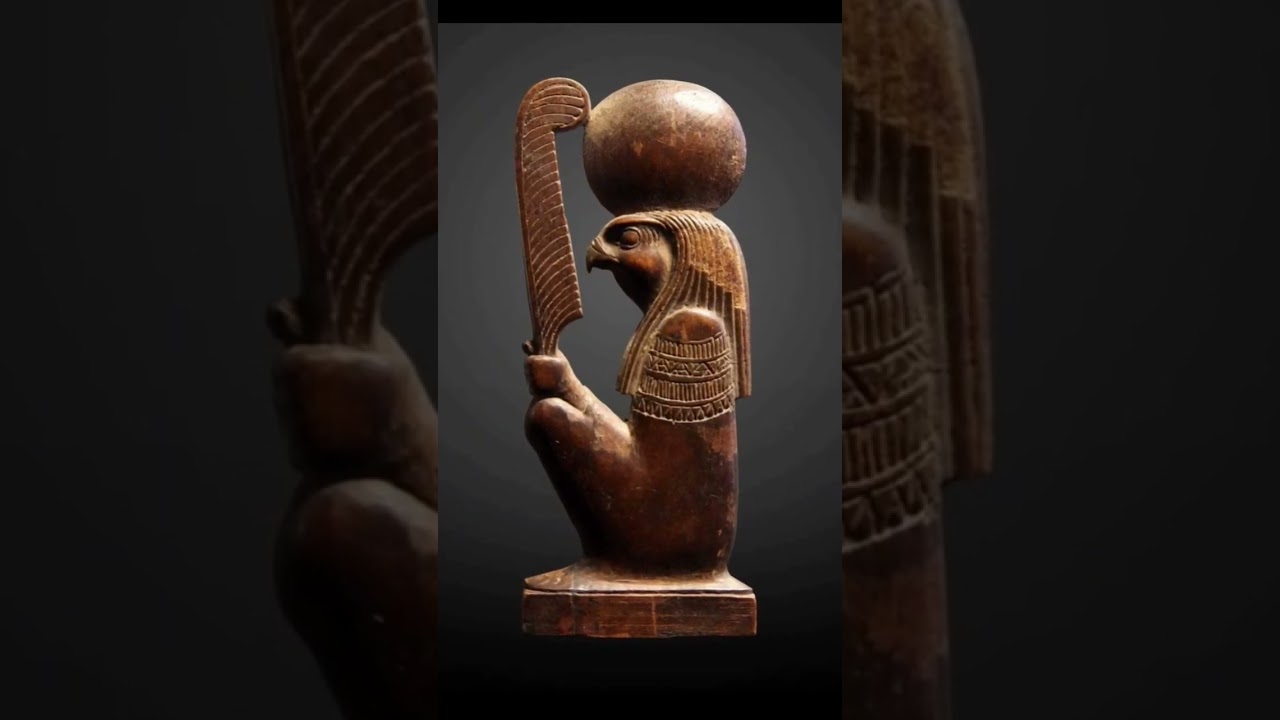God Ra-Horakhty ('Ra, who is Horusof the Two Horizons') holding thefeather of the goddess Maat.