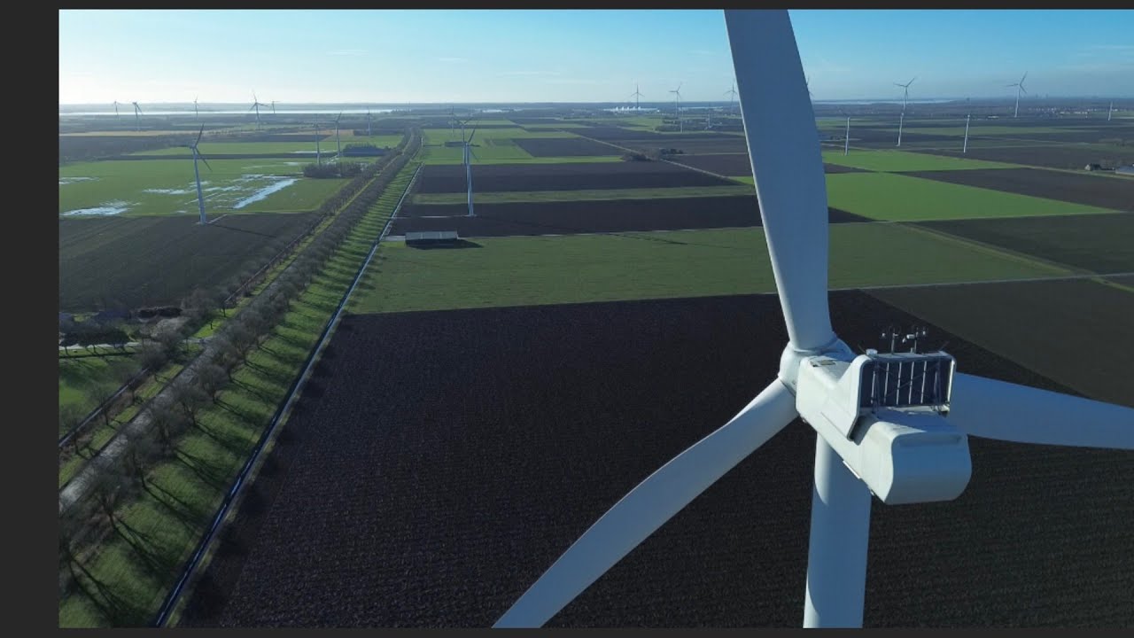 Dronebeelden vanuit de Flevopolder... Windmolens in de winterzon!