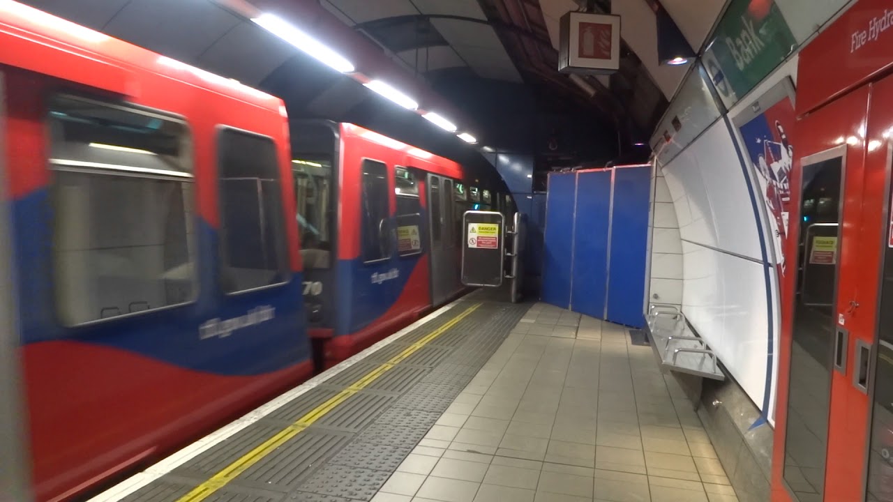 DLR train departing from Bank