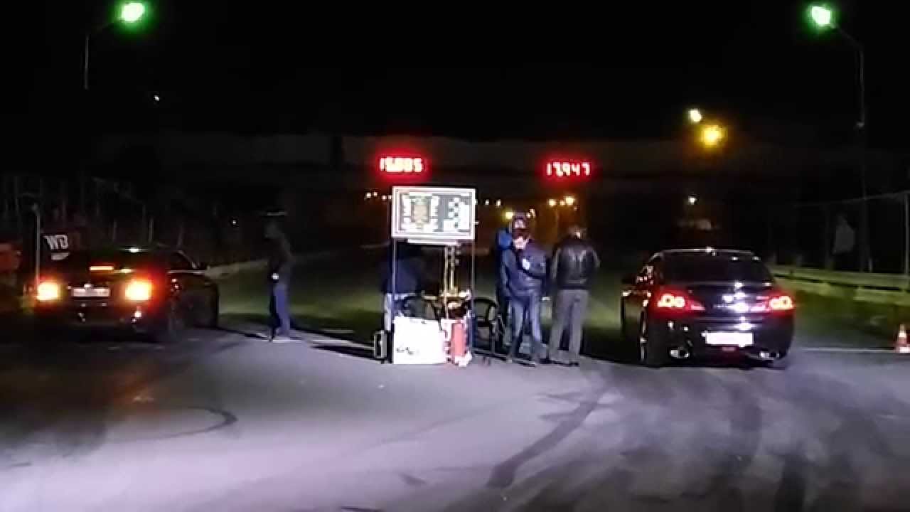 Infiniti G35x vs Mercedes CLS 55 AMG race 2