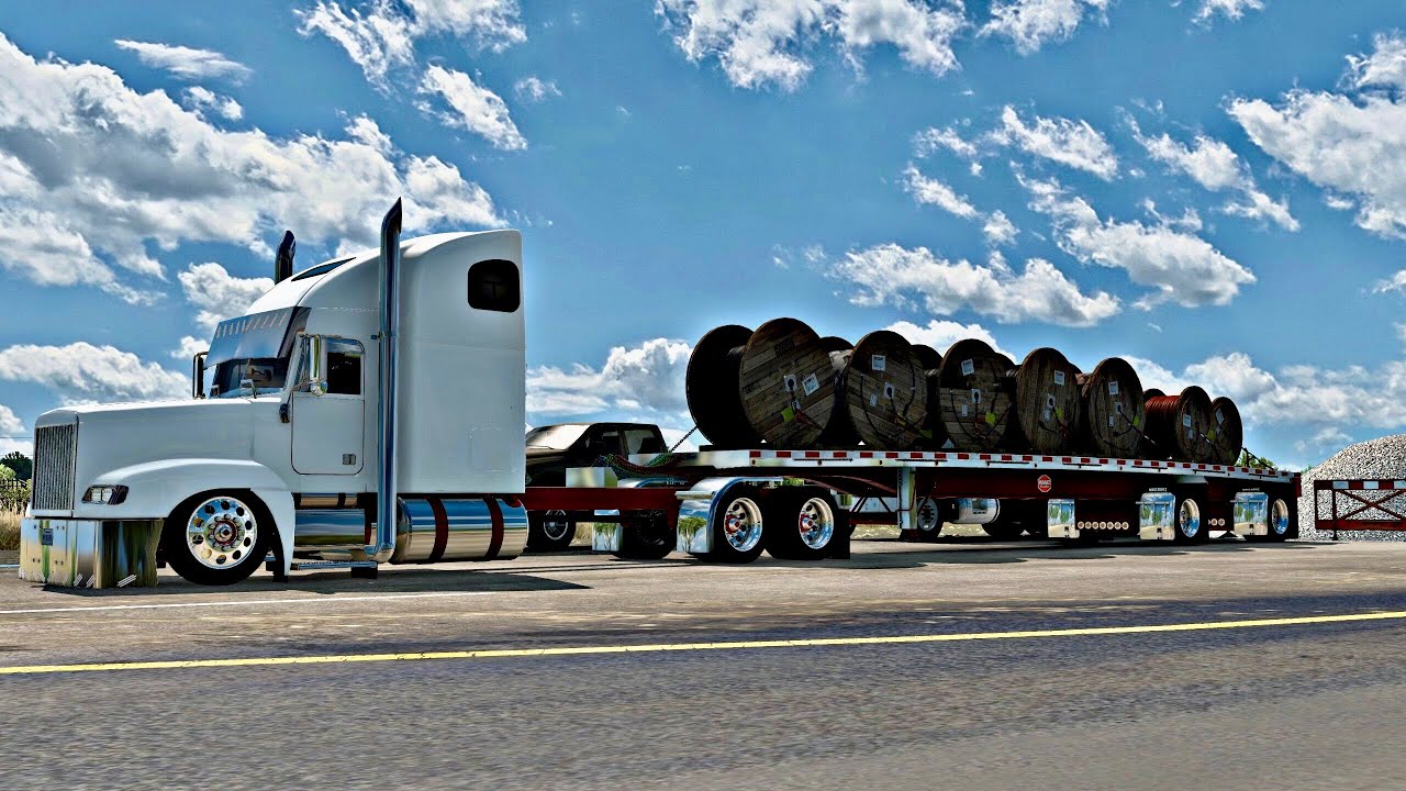 FREIGHTLINER FLD: THE ULTIMATE HAULER! MAC FLATBED,N14 POWER,JAKE BRAKE FROM HELL