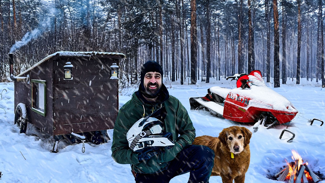 Escaping a WINTER STORM in our Snowmobile Cabin!