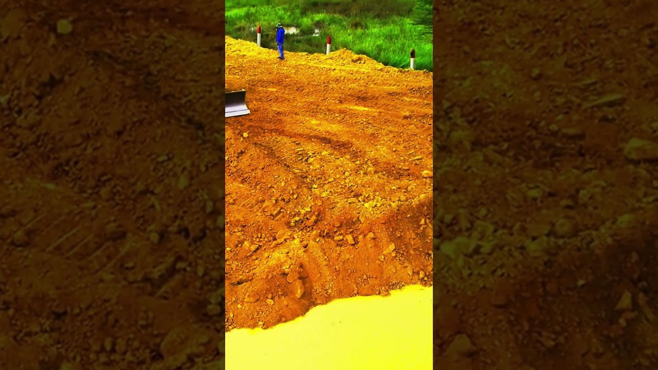 Heavy Machinery in Action  Bulldozer Pushing Soil to Dump Trucks EP022