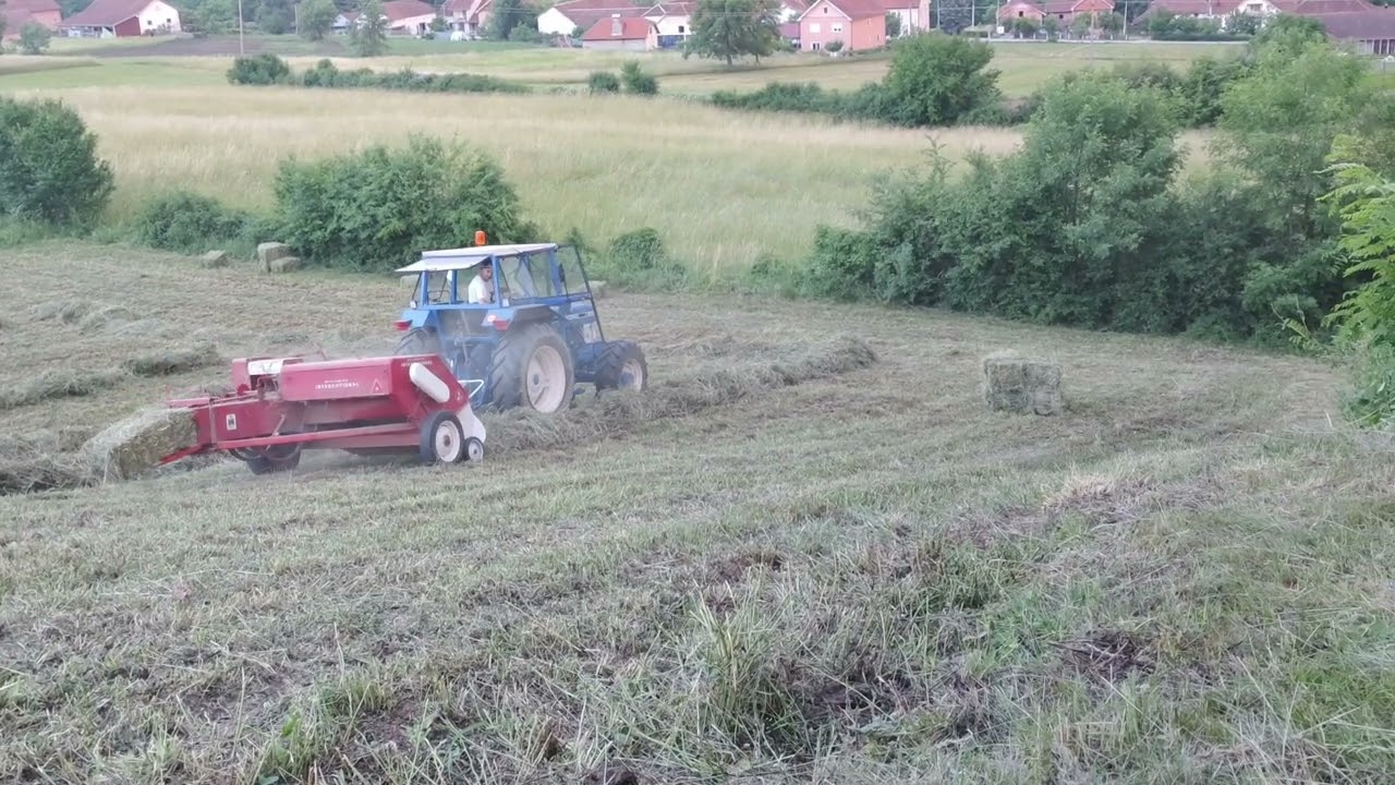 Ford 6610 baling hay