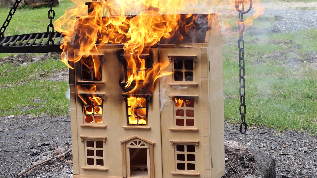 Burning wooden mini house