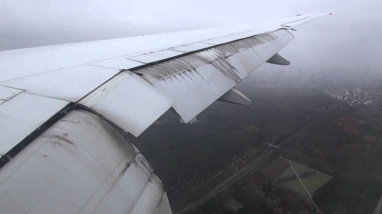 Emirates B777-300ER landing in Frankfurt (wingview) HD