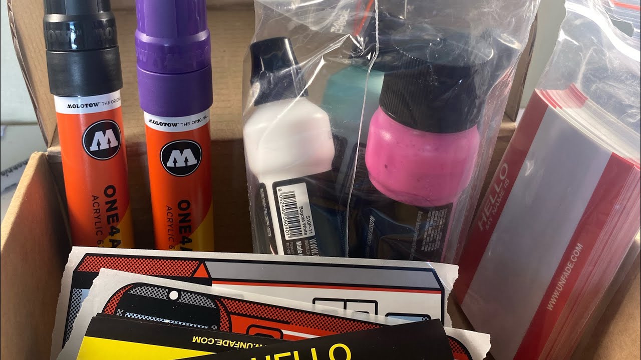 Unboxing a package from unfade-( graffiti stickers,pens and grog mops)