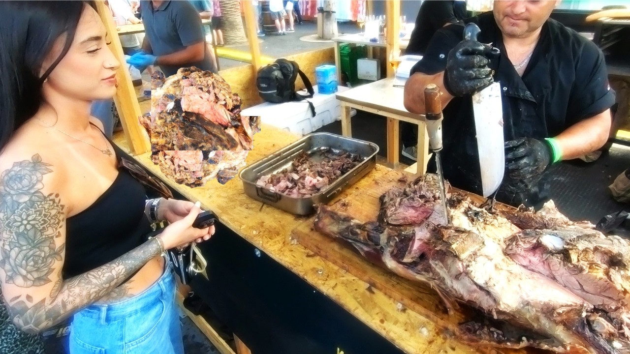 Street Food in Barcelona, Spain. Asado of Black Angus Beef. Meat&Fire Fest