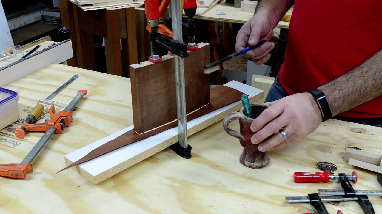 Trimming veneer on curved drawer front