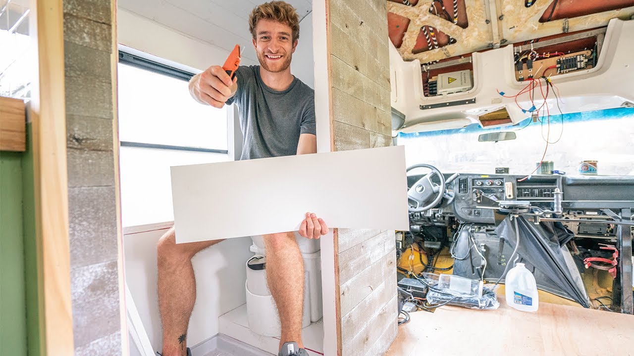 Installing Plastic Bathroom Walls in School Bus Tiny Home - Skoolie Build Ep. 54
