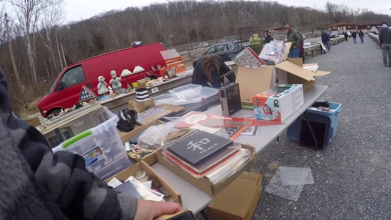 Shopping the fleamarket buying antiques gold treasure selling it for a quick profit fast Quick cash