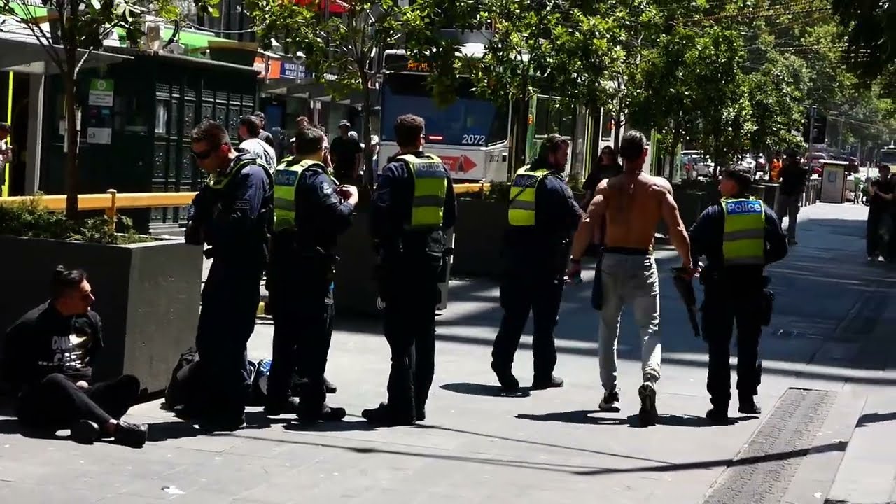 Police Action Melbourne Australia Guns Drawn. February 2026
