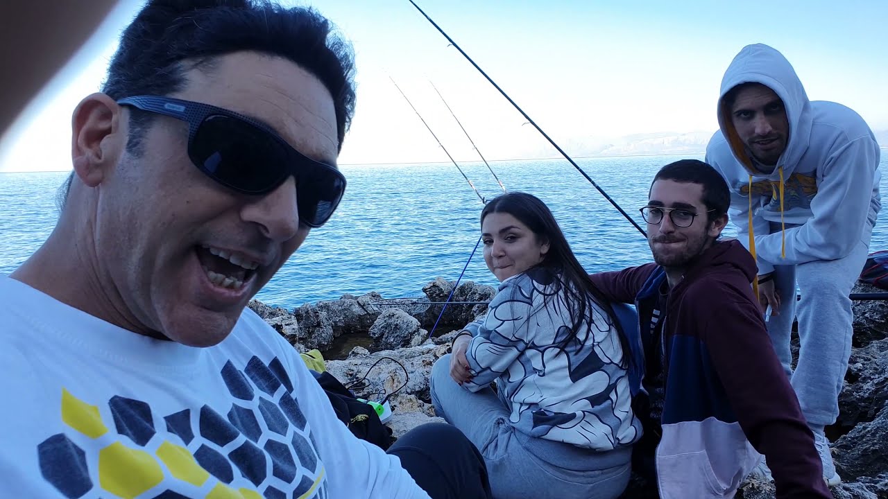 l'orata a pesca dalla scogliera con l'innesco del bibi di chioggia e l'innesco del verme di rimini