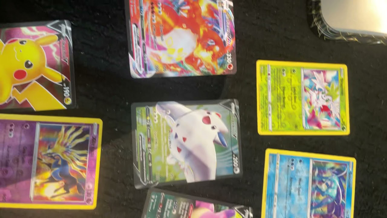 Destroying rare pokemon cards like a champion