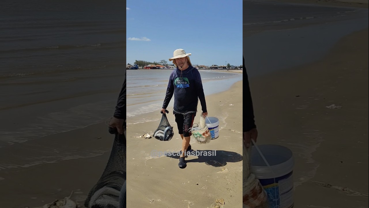 Tarrafeador Paulo e as tainhas pescadas, na Barra de Tramandaí, RS. 