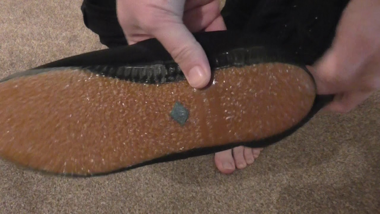Changing into vintage 1960s black plimsolls  ( canvas sneakers ) Woolworths