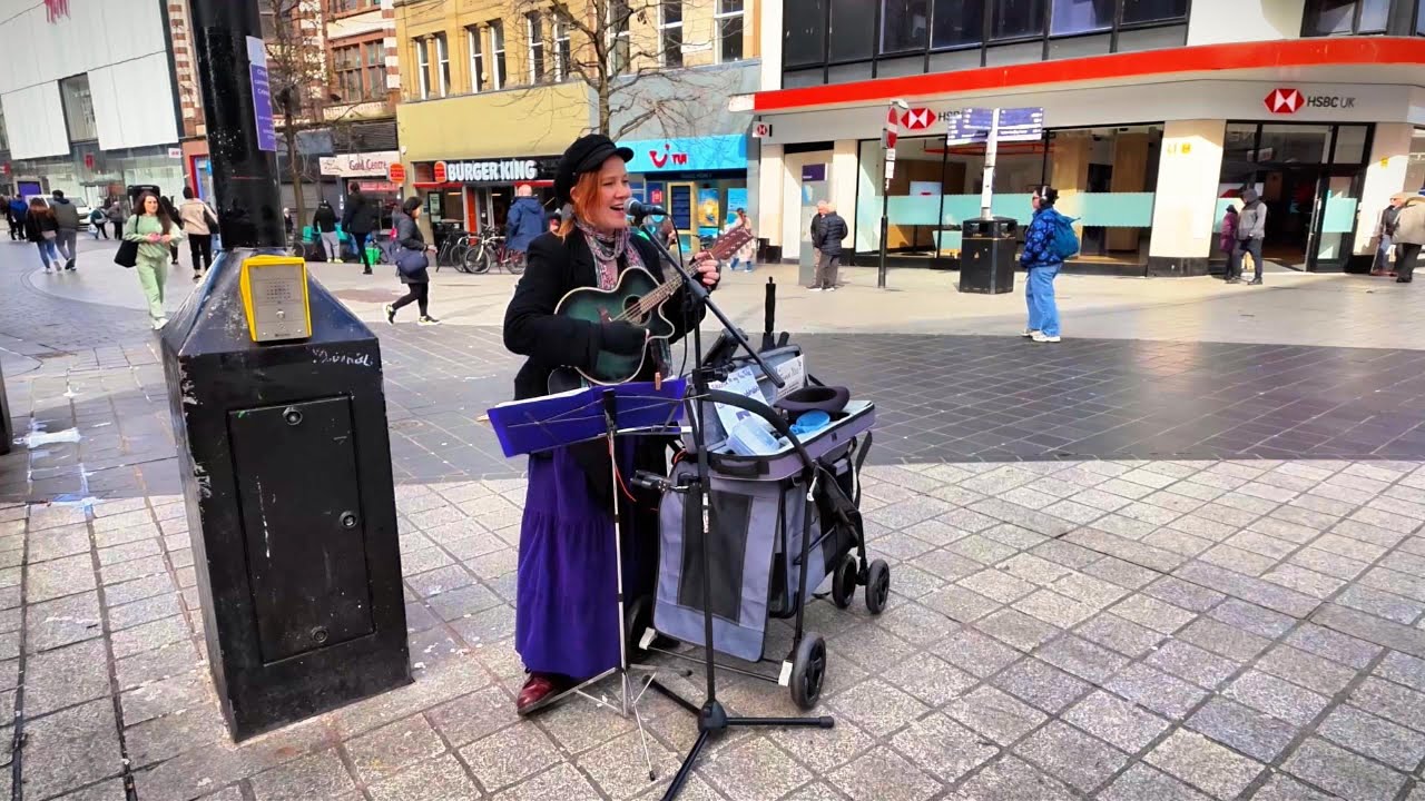 The amazing Laura Carr performing Leaving of Liverpool in the streets of Liverpool