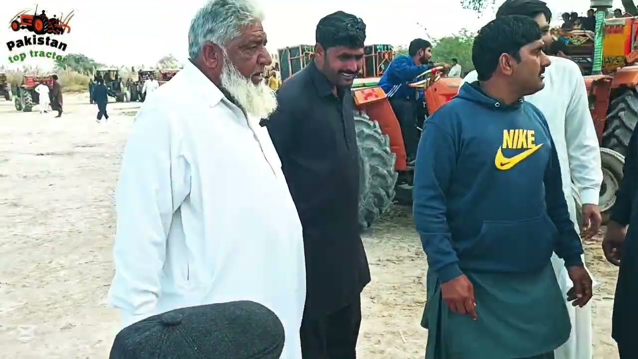 Old Man and Young man driver's Tochan mokabala with New Holland 480 tractor 